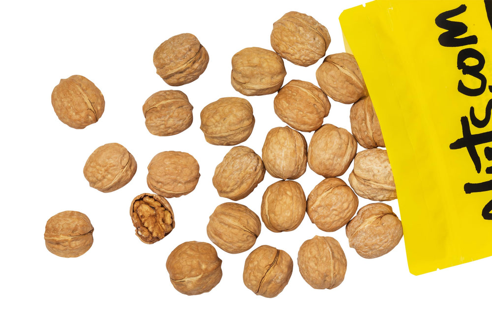 Nuts.com walnuts shell crack close-up demonstrates easy access to crunchy, buttery kernels.