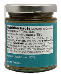 Nutural World pistachio butter texture closeup shows velvety paste and natural specks.