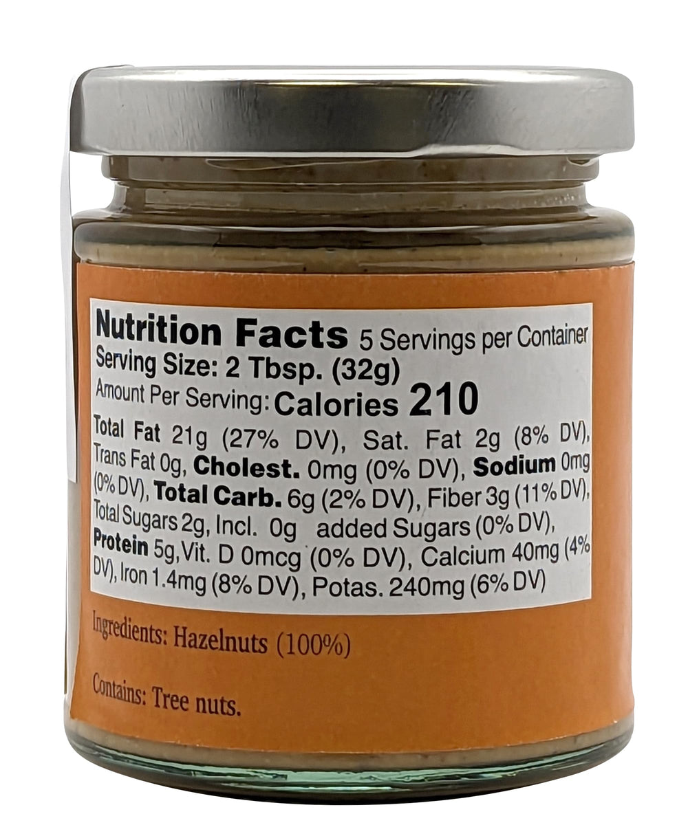 Nutural World smooth hazelnut butter jar with spoon, creamy texture for desserts