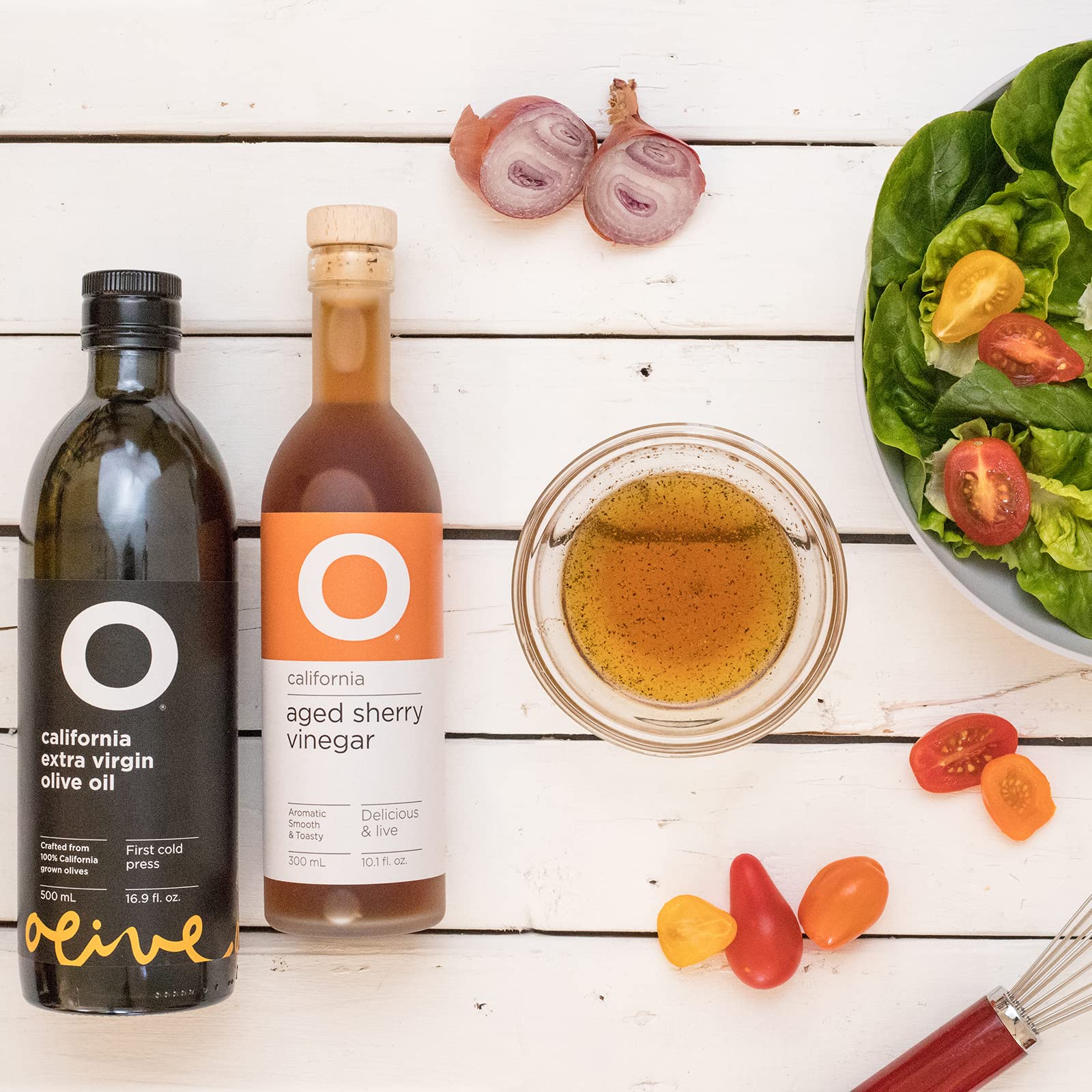 O Olive Oil vinaigrette with sherry vinegar delivers classic balance.