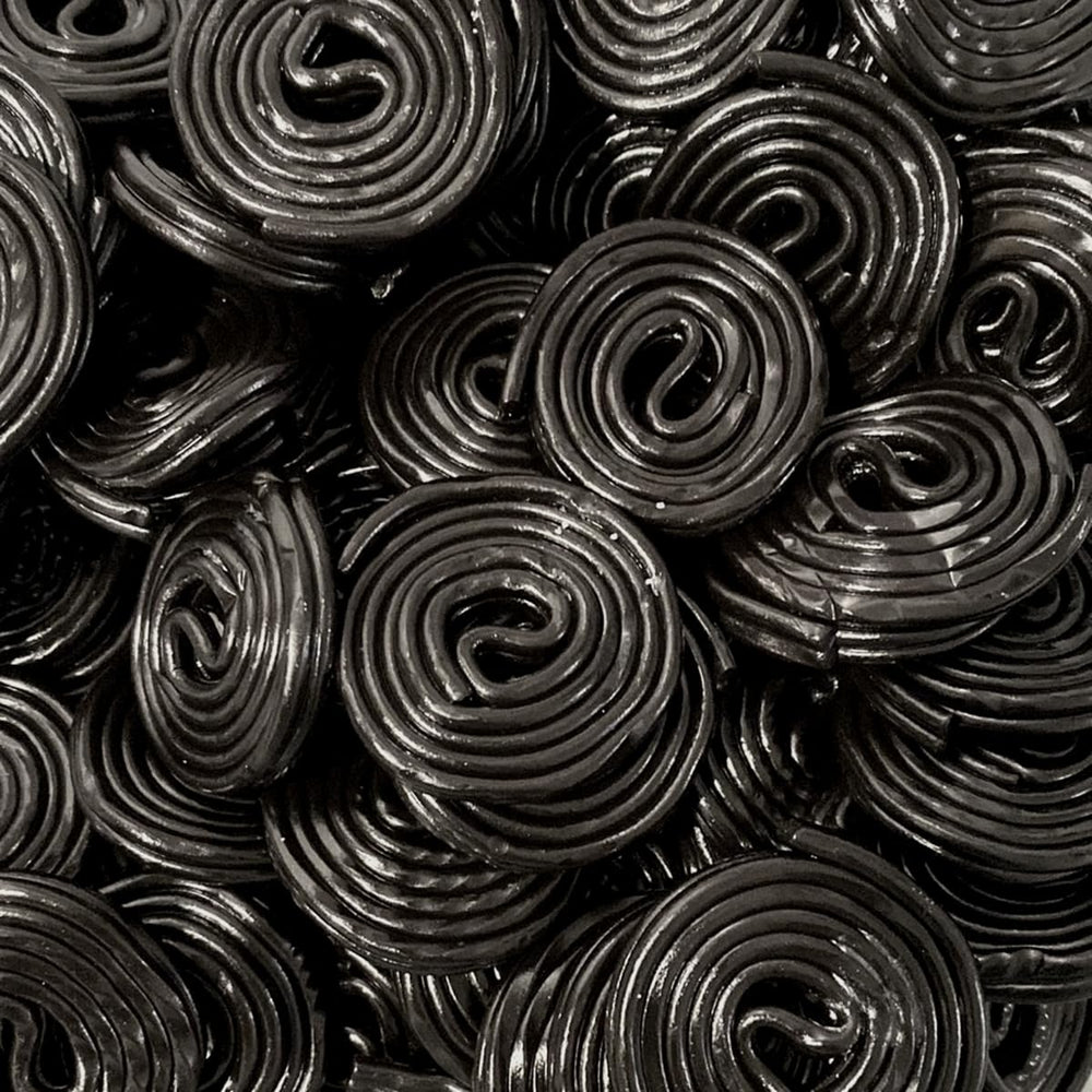 OBELYS Black Licorice Wheels 1lb bag: soft, chewy texture for easy sharing.