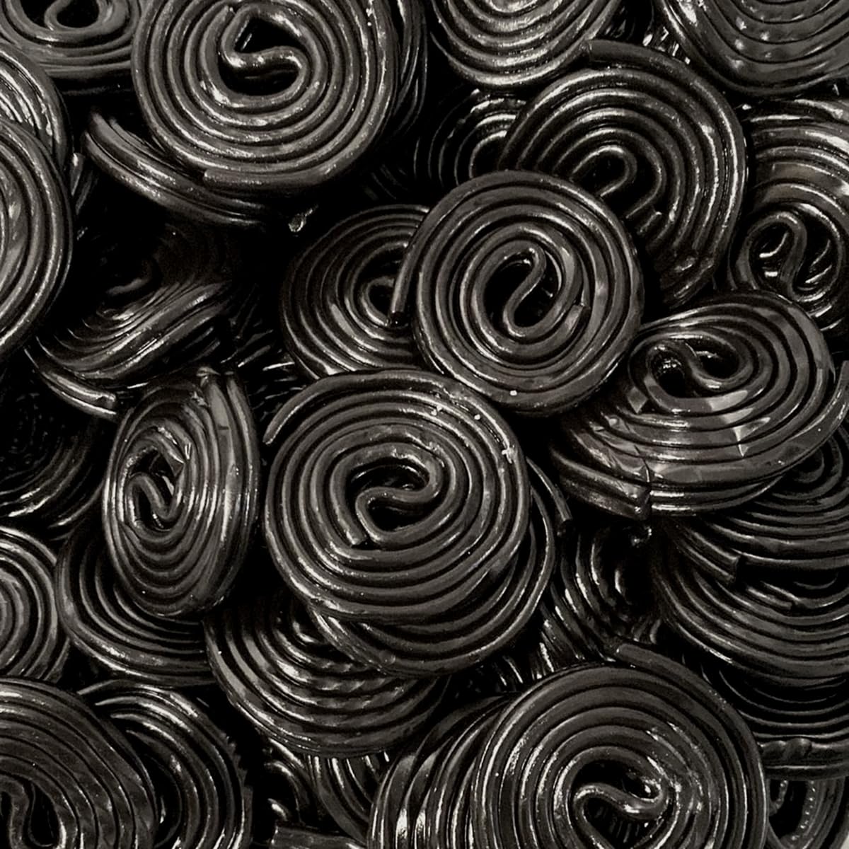 OBELYS Black Licorice Wheels 1lb bag: soft, chewy texture for easy sharing.