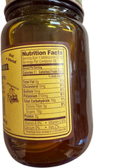 Oberholtzer's Pure Kentucky Sorghum pour demonstrates smooth flow for pancakes or glaze.