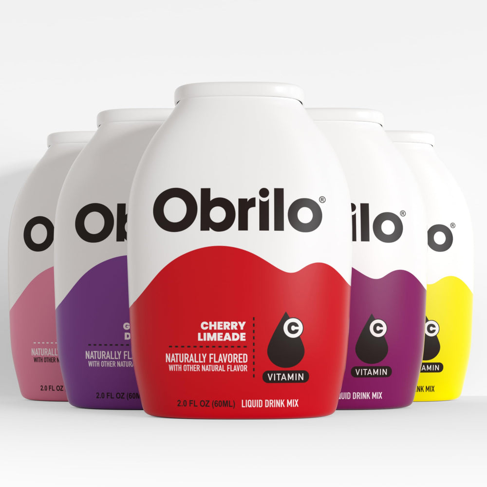 Obrilo Water Enhancer cherry bottle pour for a sugar-free flavor boost.