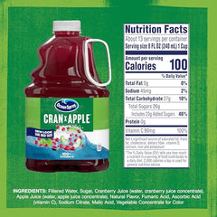 Ocean Spray Cran-Apple bottle pour highlights tart cranberry with crisp apple layers for bold mixed drinks.