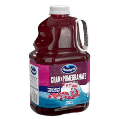 Ocean Spray Cran-Pomegranate pour into glass demonstrates versatile serving for gatherings.