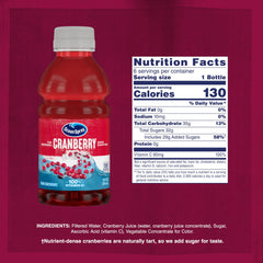Ocean Spray Cranberry Cocktail bottle pouring into a chilled glass.