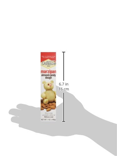 Hand shaping Odense marzipan dough to show pliable texture