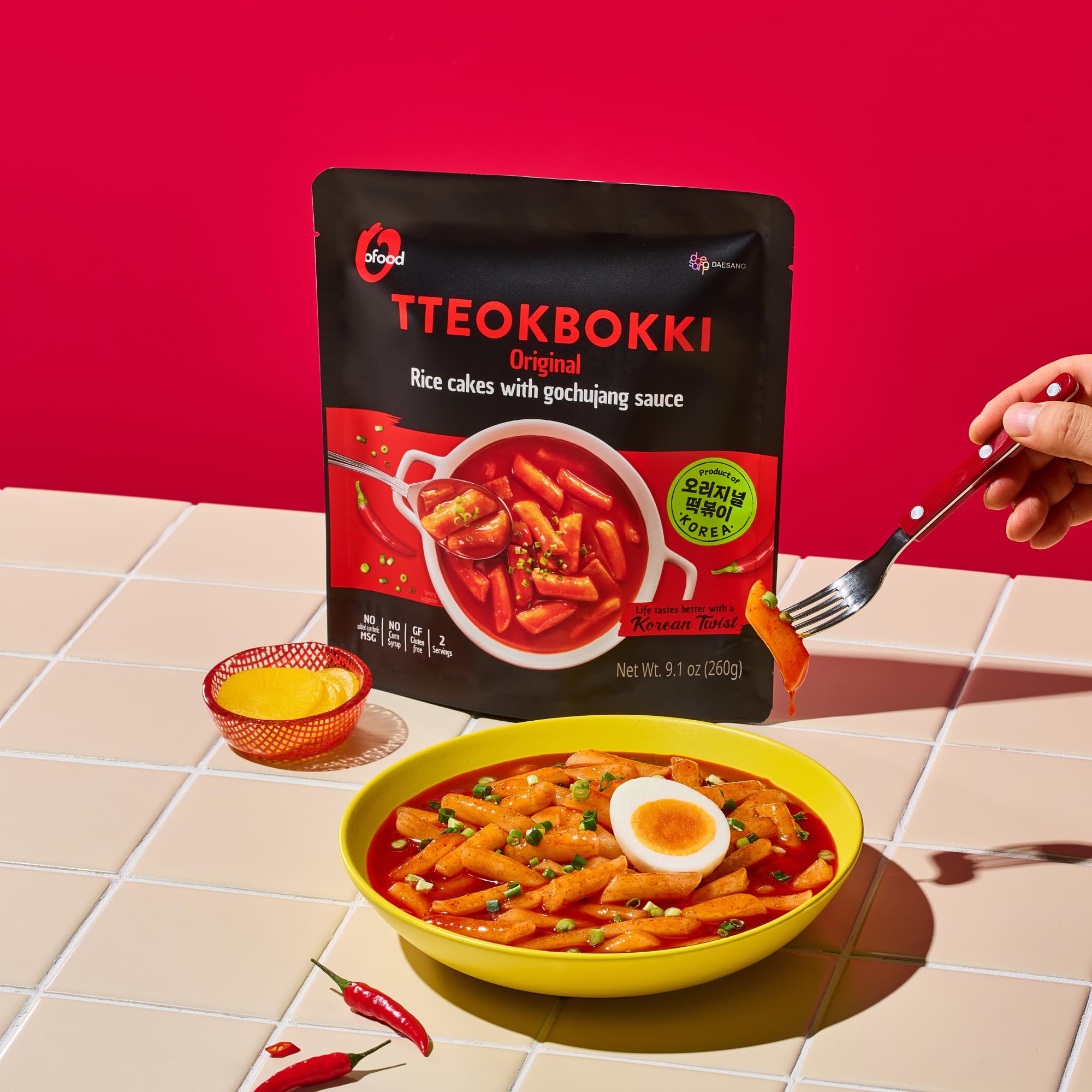 O’Food Tteokbokki rose spicy carbonara sauce shot, bold fusion flavor.