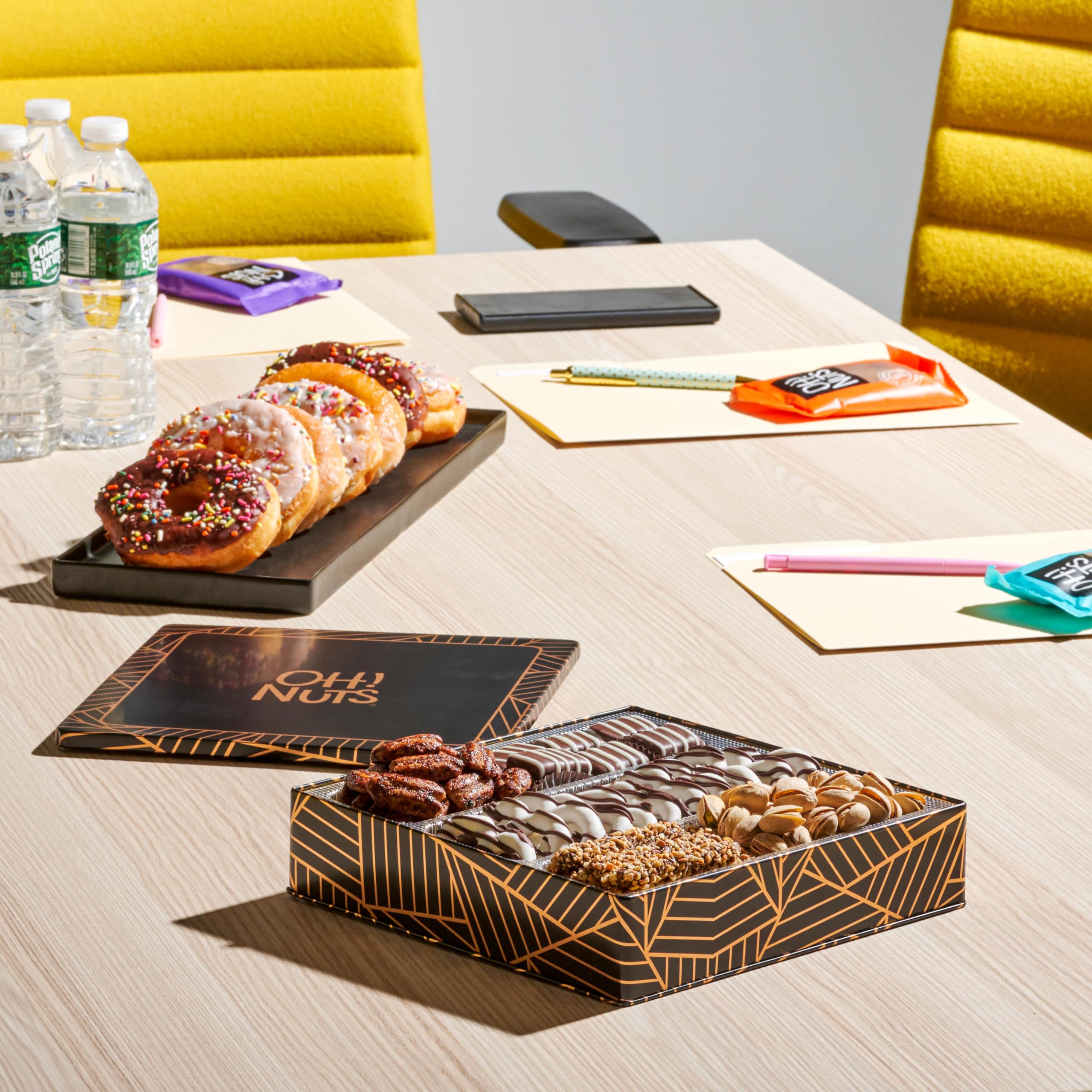 Oh! Nuts pretzels and nuts selection on a lined tray.