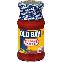 OLD BAY Cocktail Sauce bottle pouring, elevating shrimp and seafood with bold, tangy flavor.