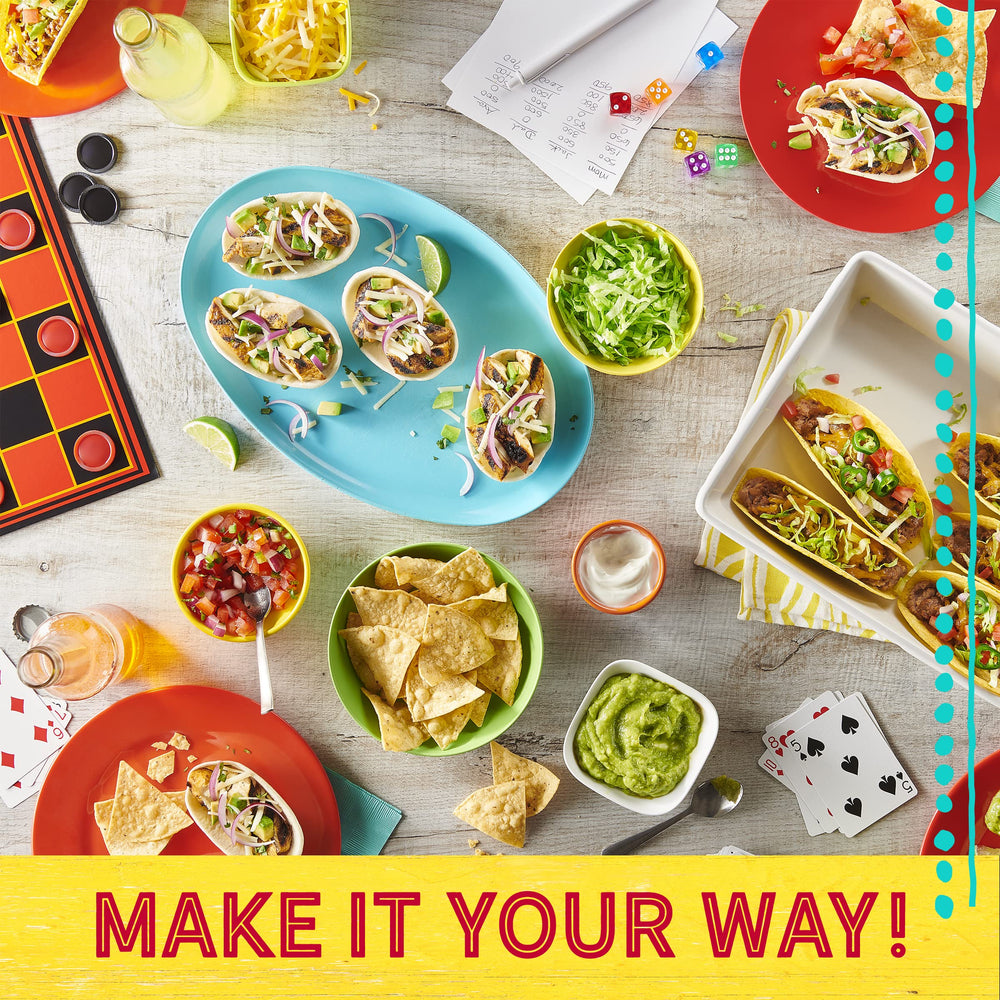 Family dinner scene with Old El Paso taco night using mini bowls