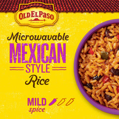 Close-up of rice, beans, peppers, and paprika shows Mexican style ingredients.