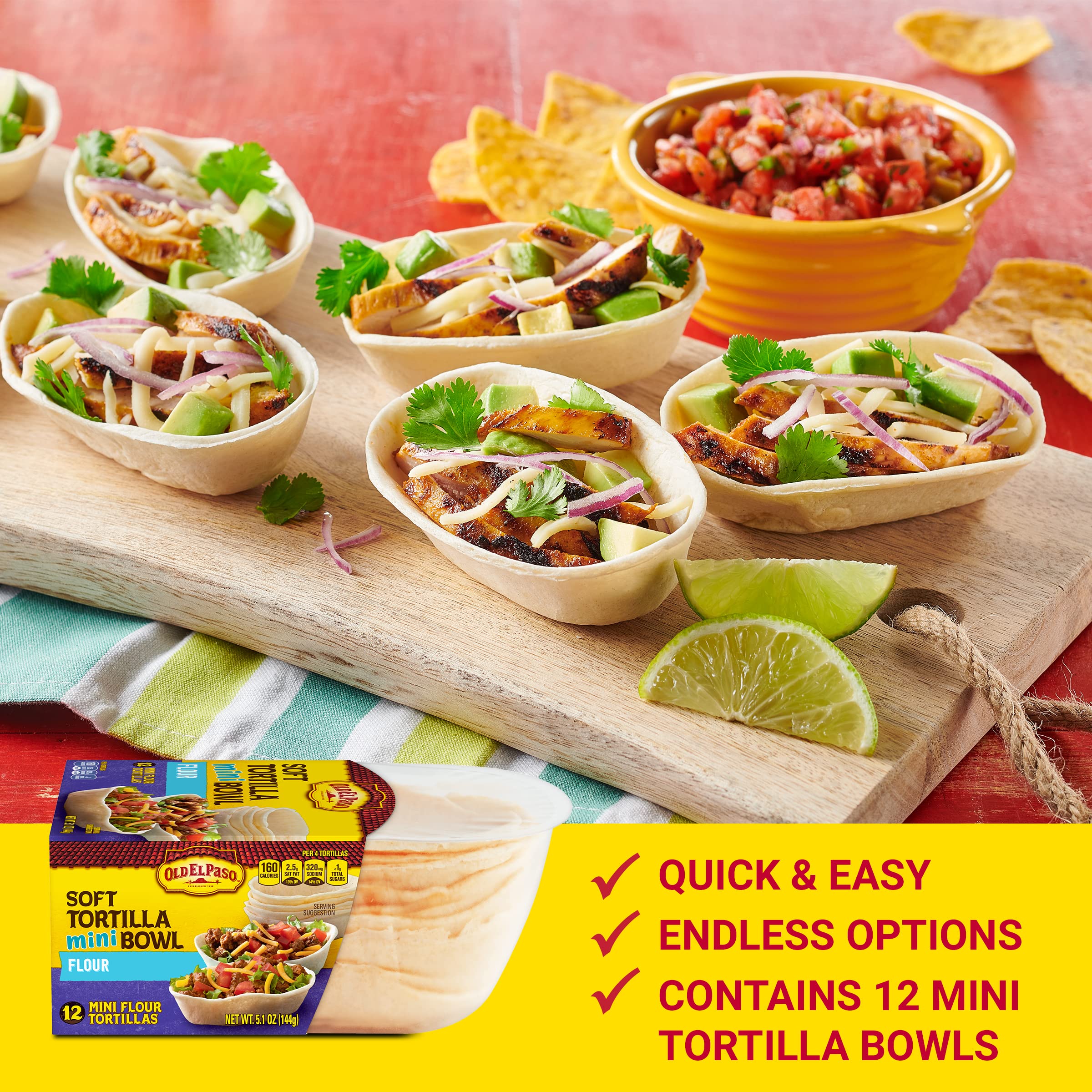 Mini tortilla bowls filled with meat and toppings for a tasty bite