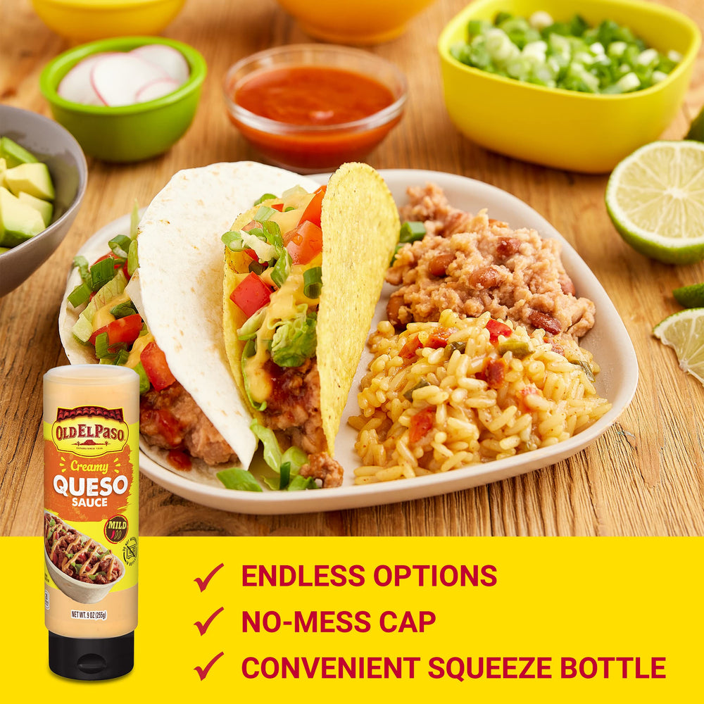 Closeup of squeeze bottle releasing a smooth cheese drizzle by Old El Paso.