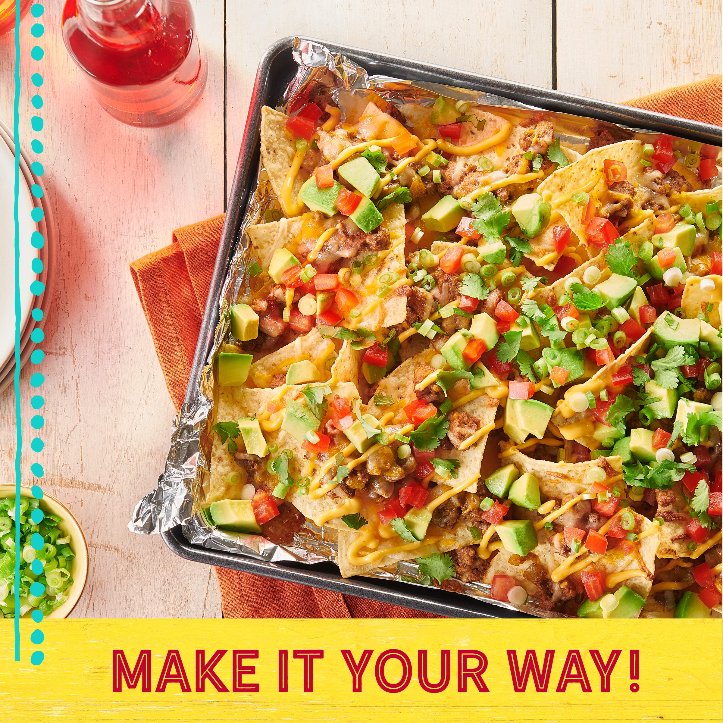 Old El Paso seasoning near dips for flavorful nachos.
