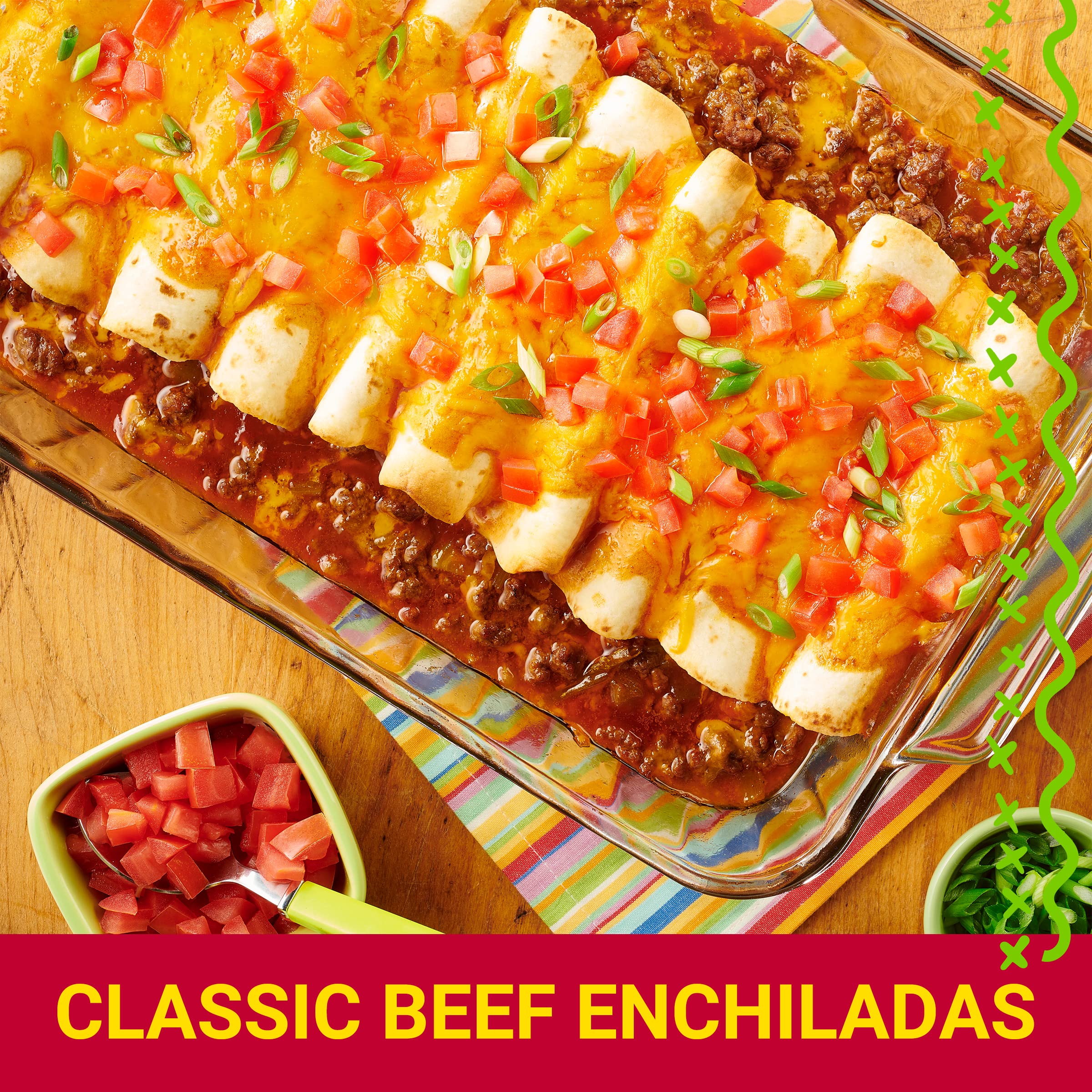 Old El Paso seasoning spoon dipping into a prepared dip.
