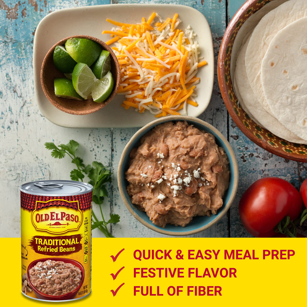 Old El Paso Traditional Refried Beans on stovetop simmer, enriches any dish.