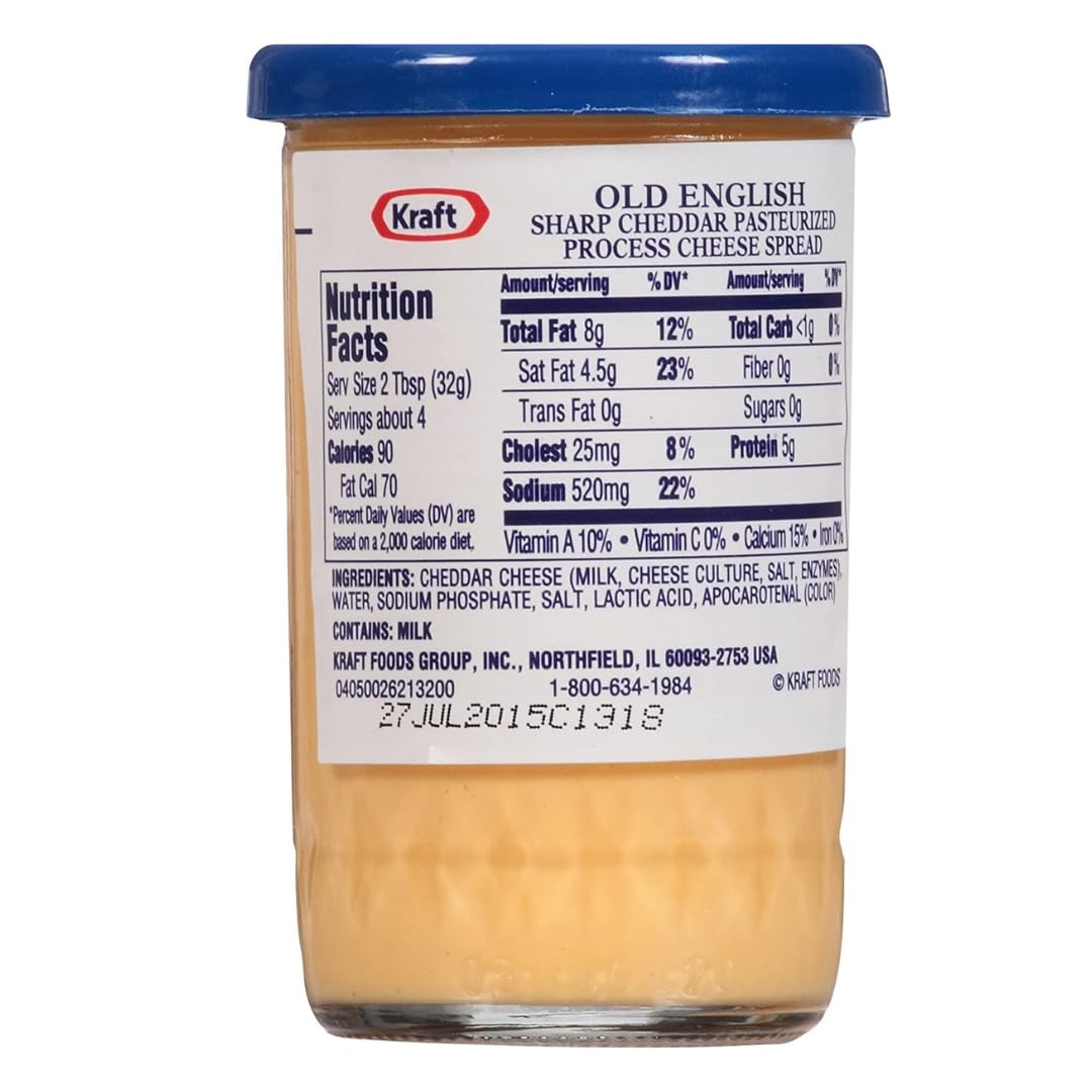Old English Cheese Spread being scooped from the jar for easy spreading