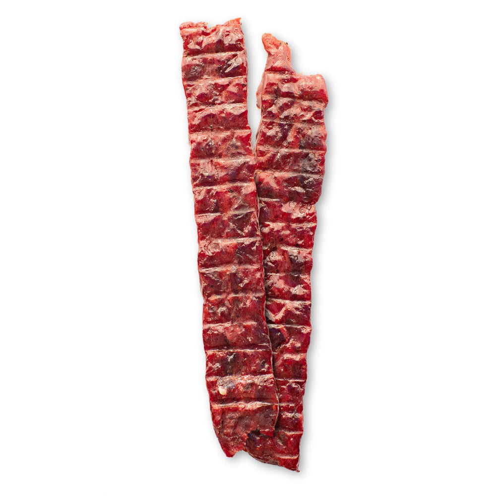 Old Trapper kippered steak bulk 12-pack on pantry shelf for easy stocking