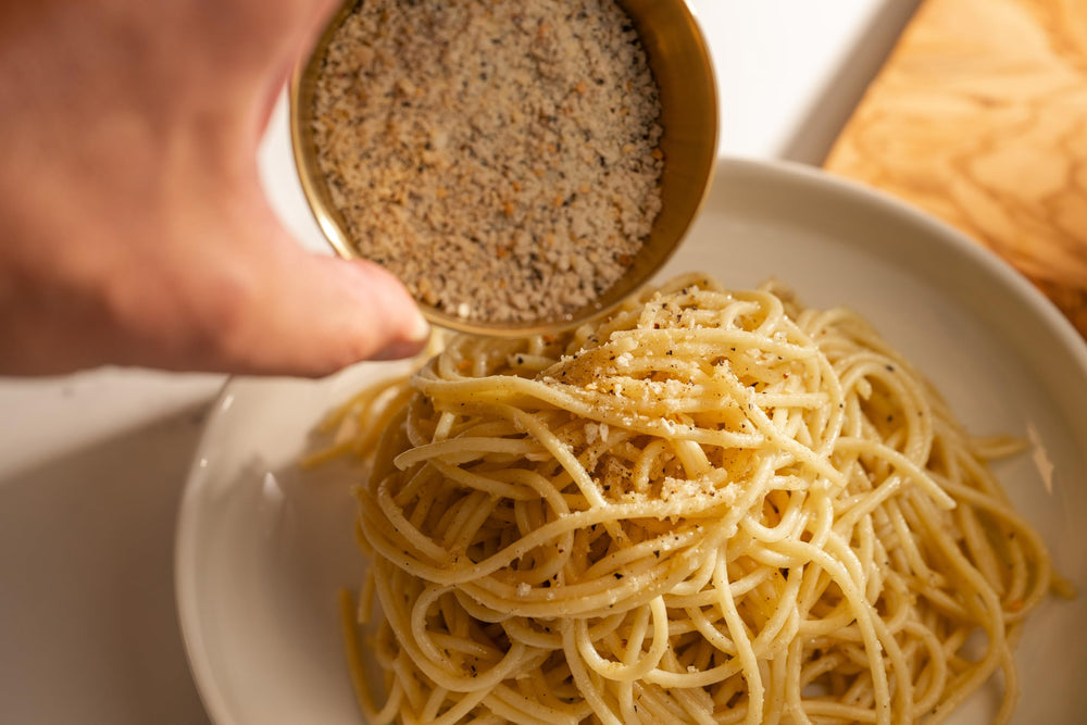 Olde Thompson Cacio E Pepe Crunch on roasted vegetables for depth