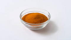 Close-up of Olde Thompson Saigon Cinnamon ground powder with rich aroma