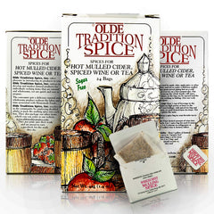 Olde Tradition Spice mulling tea bags being poured into mug for cozy warmth