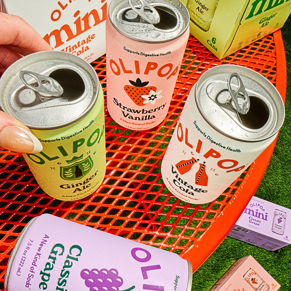 OLIPOP Classic Grape ingredient icons showing real grape juice and botanicals for a natural, flavorful beverage