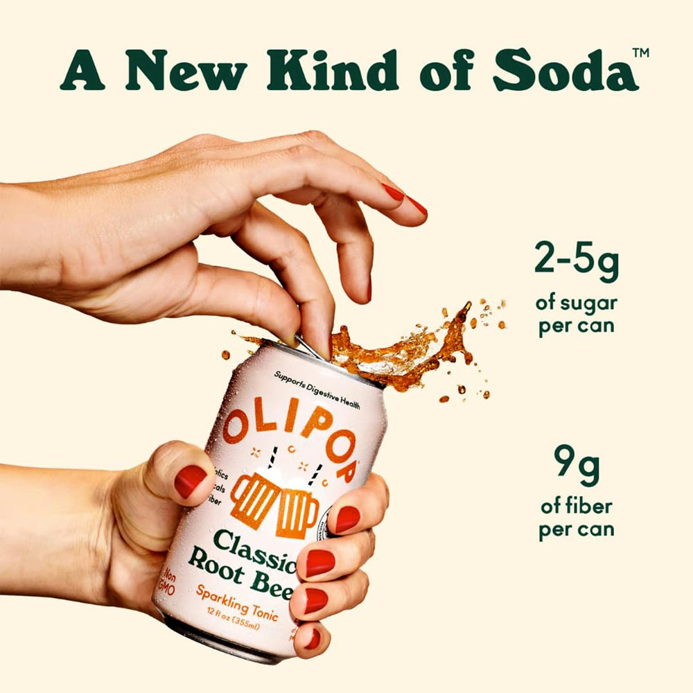 OLIPOP Classic Grape soda being poured highlights fruity aroma.