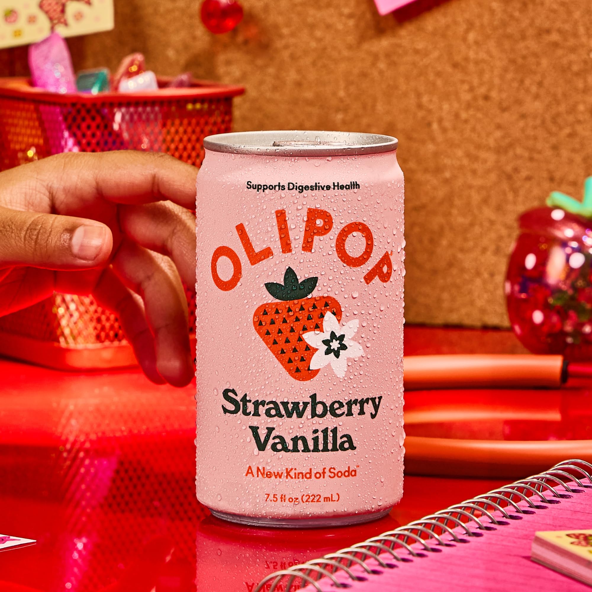 Effervescent OLIPOP Minis bubbles rising in a chilled glass.