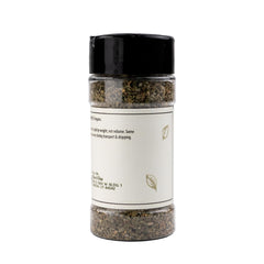 Closeup label of Olive & Vine Mexican Oregano shows authentic aroma.