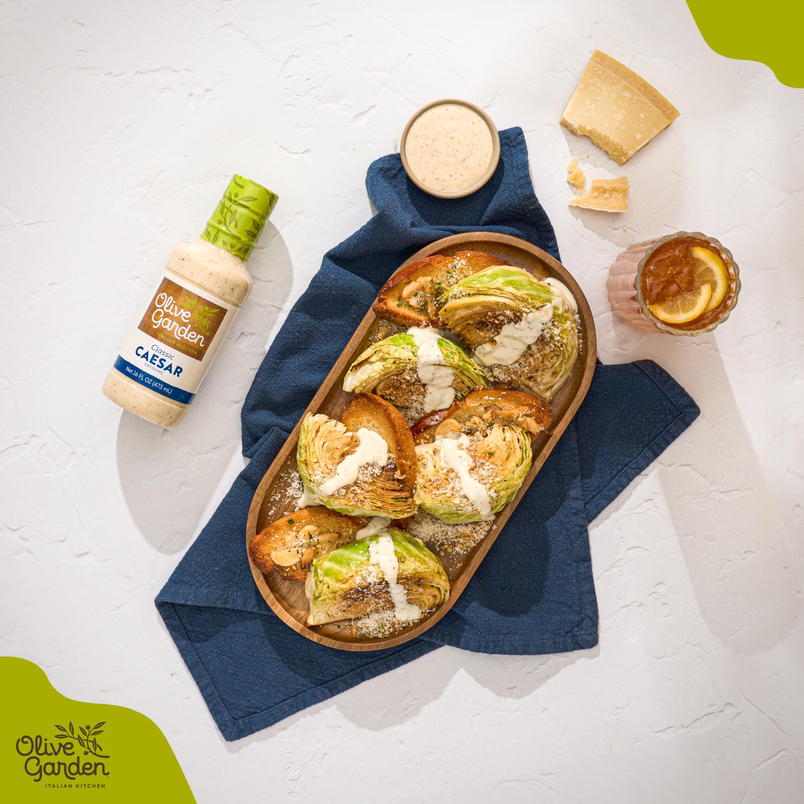 Olive Garden Caesar Dressing used as a marinade for chicken, adding depth and aroma.