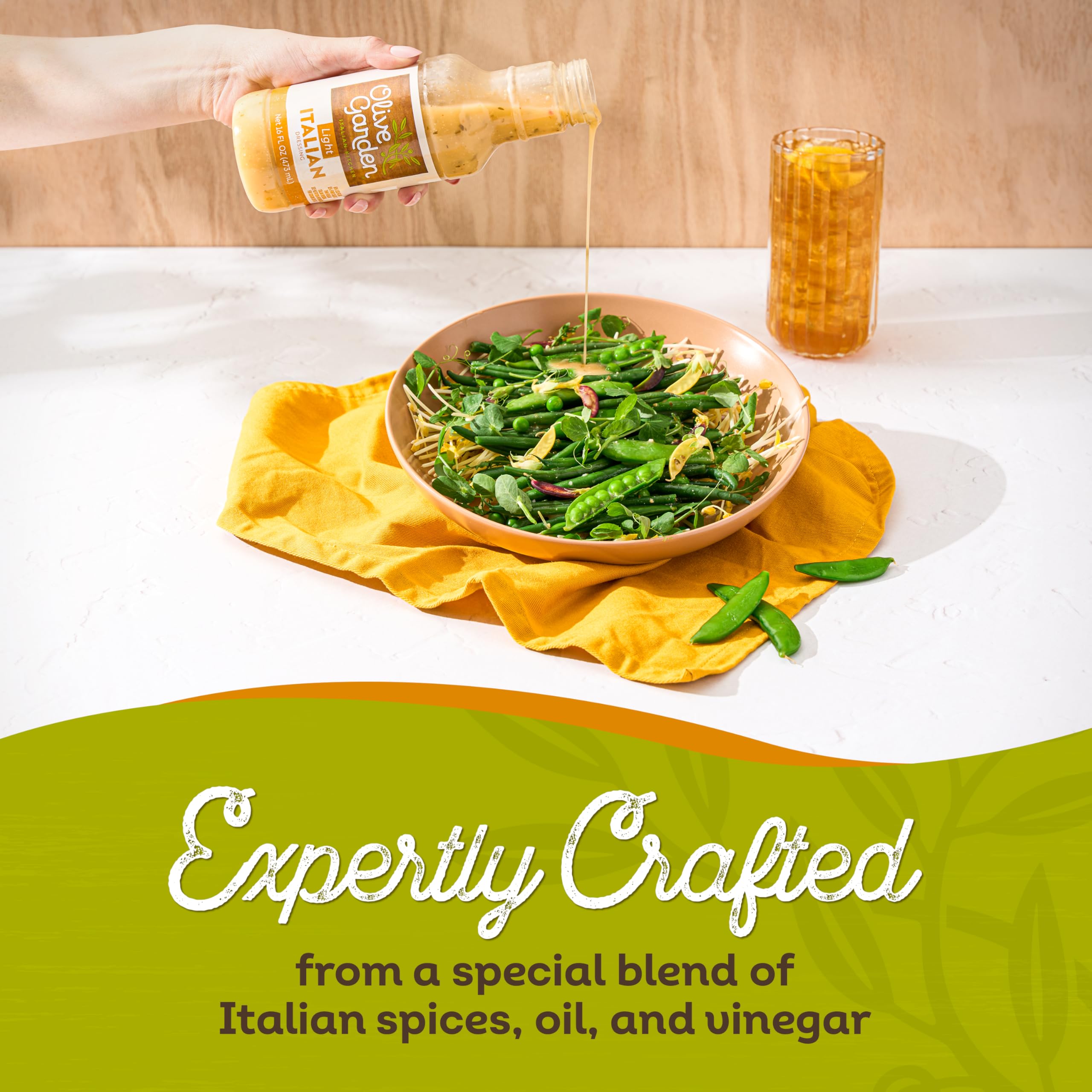 Glass jar of Olive Garden Light Italian Dressing ready to serve, gluten-free and flavorful.