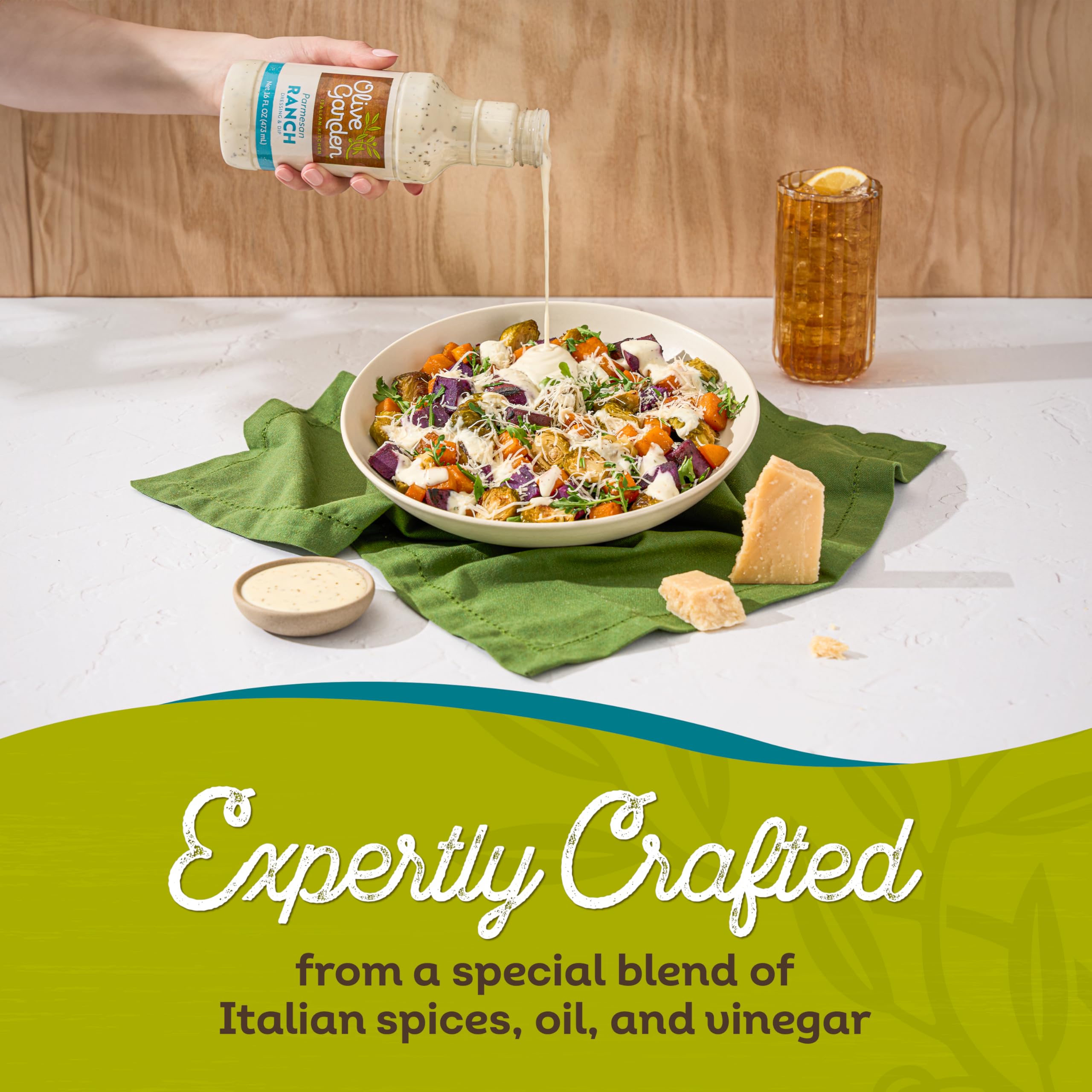 Parmesan Ranch dressing over a salad bowl enhancing greens