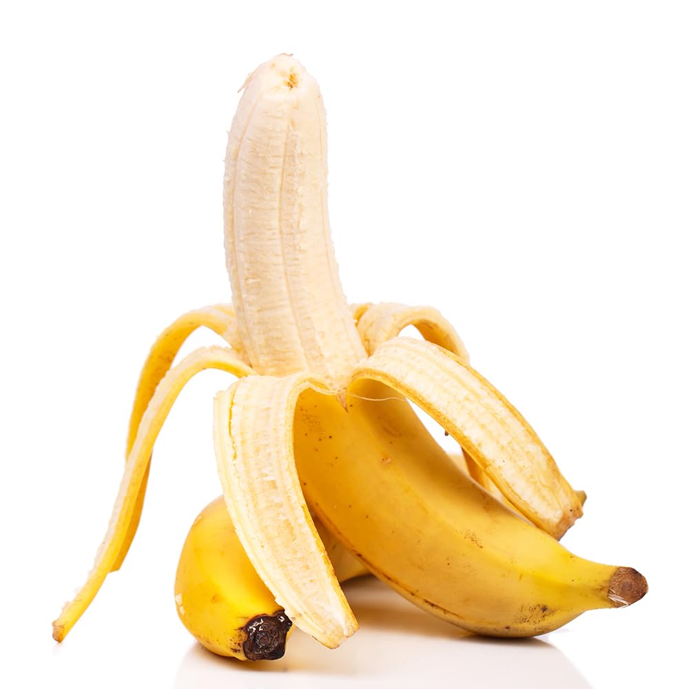 OLIVENATION banana flavor extract being poured into batter to boost notes