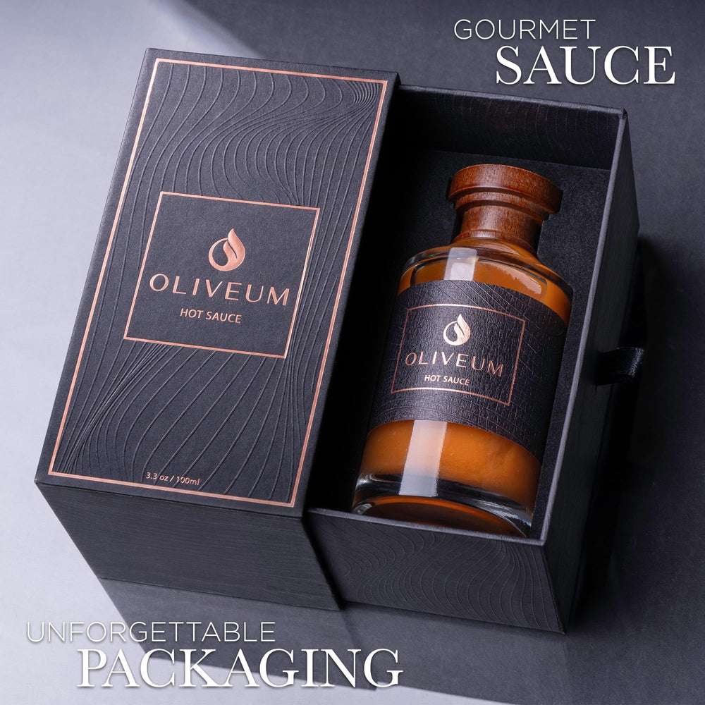 Oliveum hot sauce walnut top and copper medallion detail on premium bottle for gifting