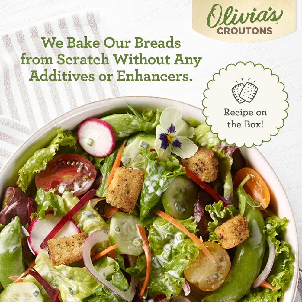 Olivia's Gluten Free Croutons on a salad with herbs for extra crunch