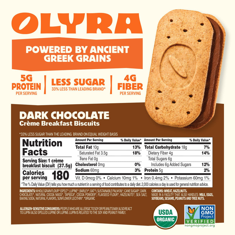 Olyra dark chocolate sandwich biscuit close-up showing rich texture and protein-packed bite.