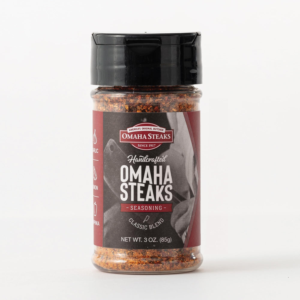 Omaha Steaks Seasoning spread over various proteins