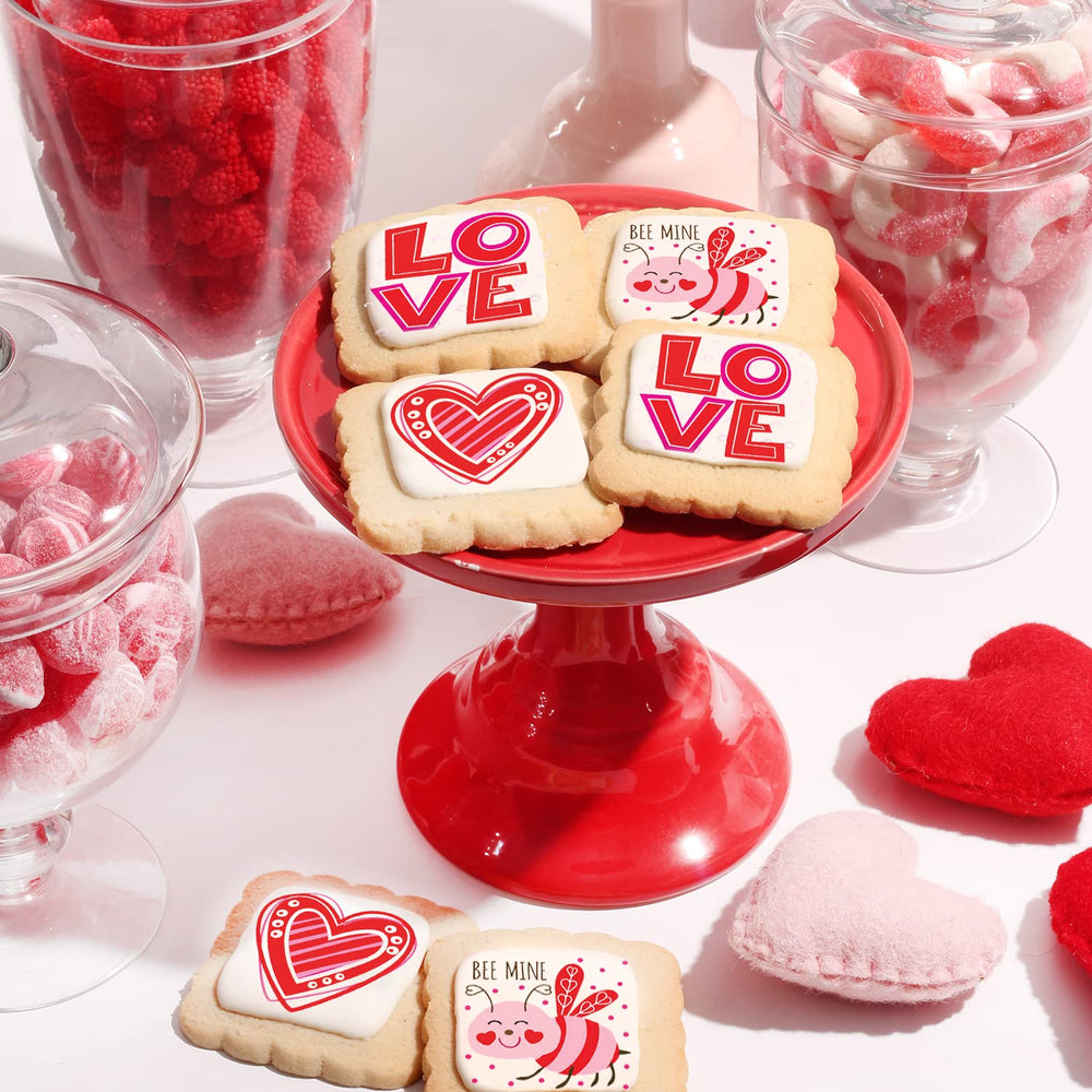 OMCookie valentines cookies vanilla frosting closeup reveals edible ink details.