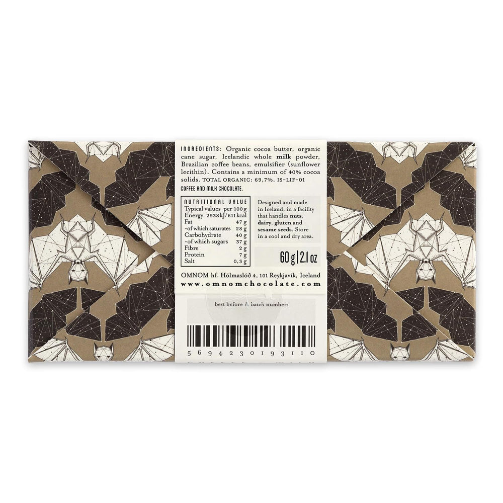 Omnom Coffee + Milk bar slice reveals creamy interior with cappuccino notes.
