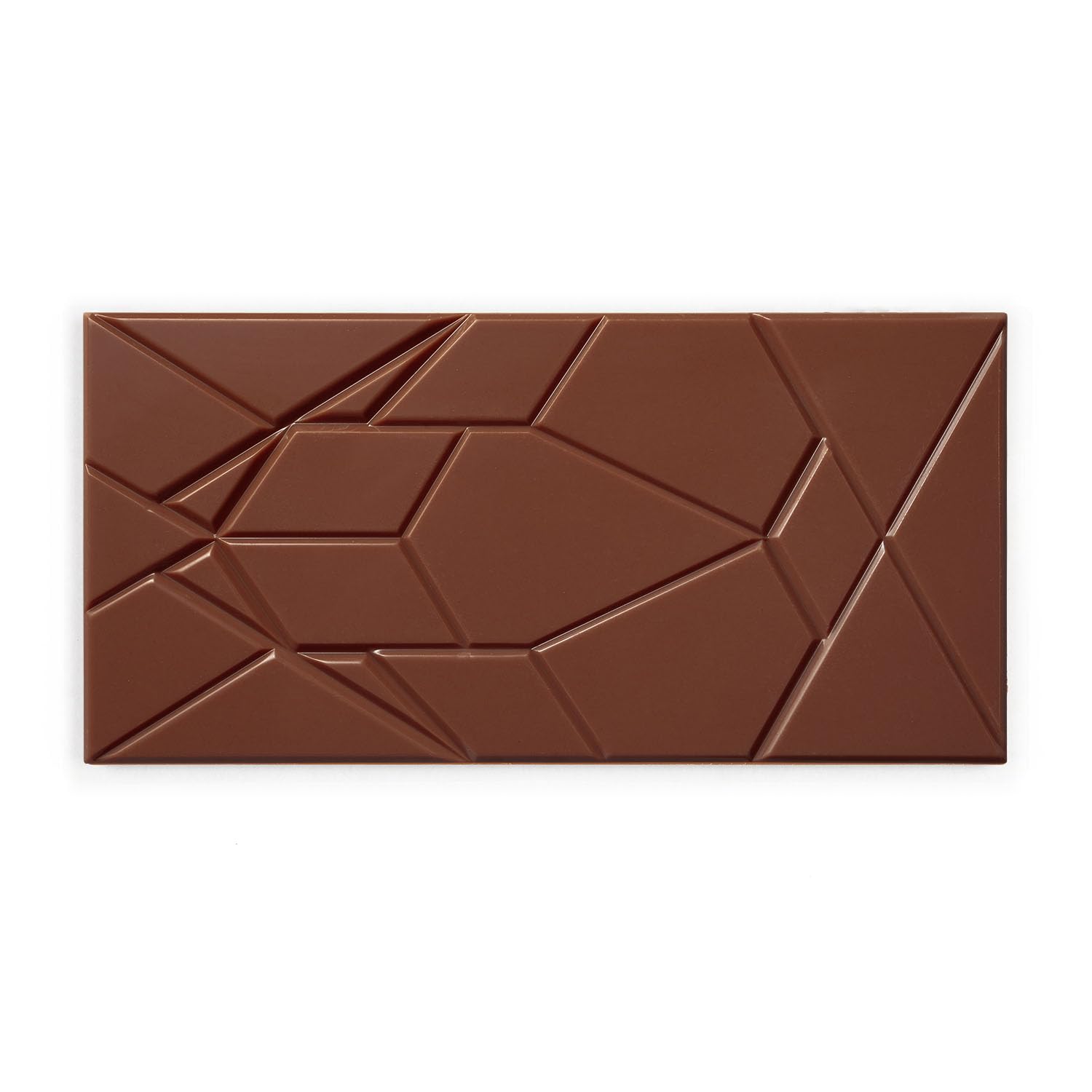 Close-up of Omnom Coffee + Milk texture shows smooth melt and hazelnut hints.
