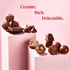 On Occasion gift tin unboxing closeup reveals a carefully arranged relish of premium sweets.