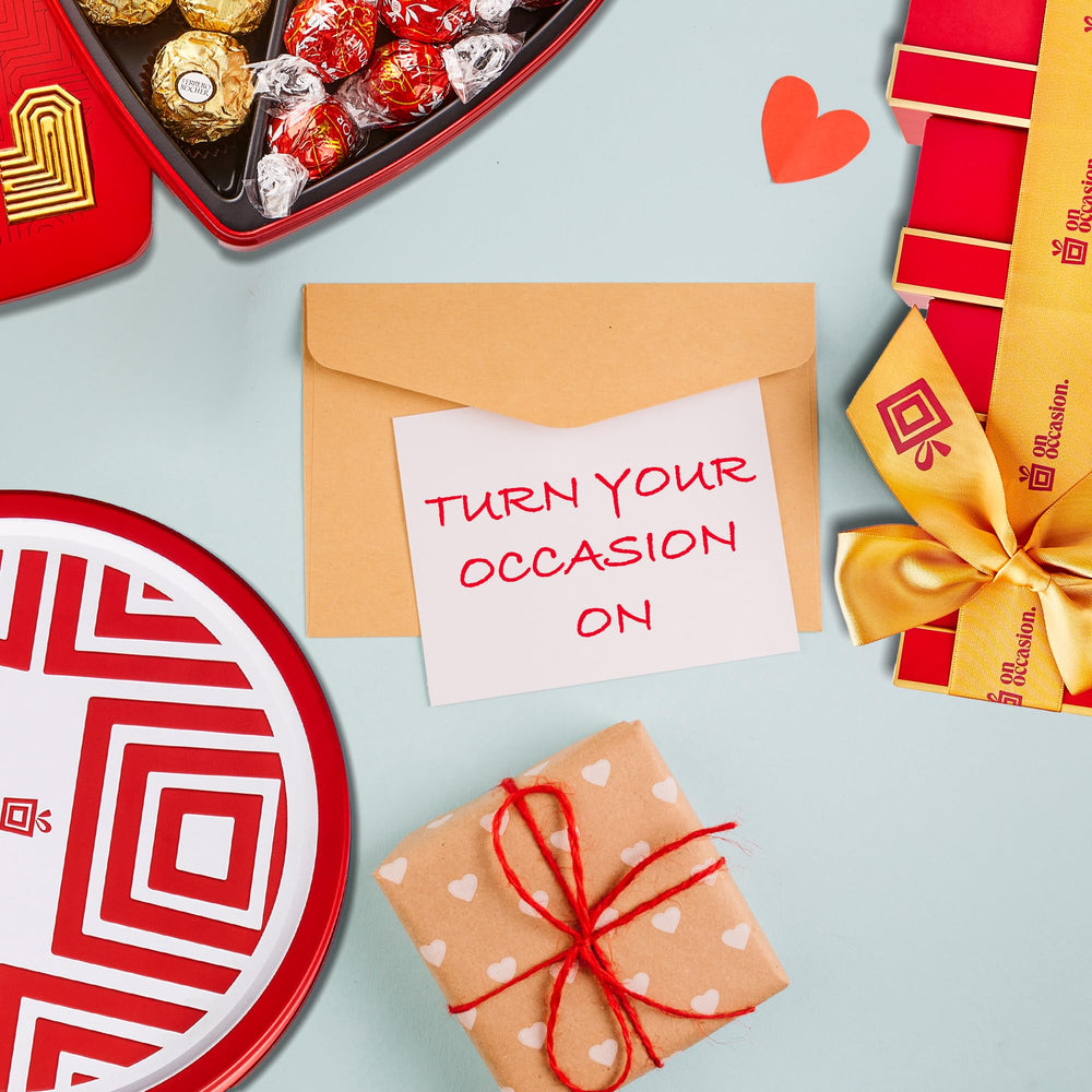 On Occasion Lindt milk truffles pack closeup showcases creamy centers and silky coating.
