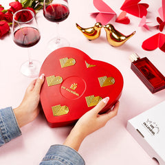 On Occasion red tin packaging showcases premium Easter chocolate presentation.
