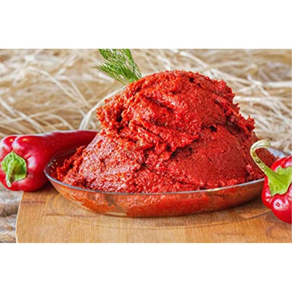 Oncu Turkish hot pepper paste 700g bottle for adding heat to stews and sauces.
