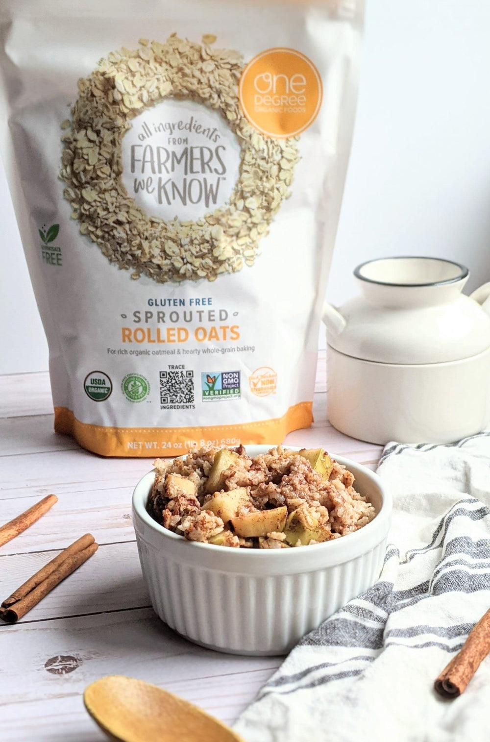 One Degree Organic gluten free sprouted rolled oats measured in a cup.