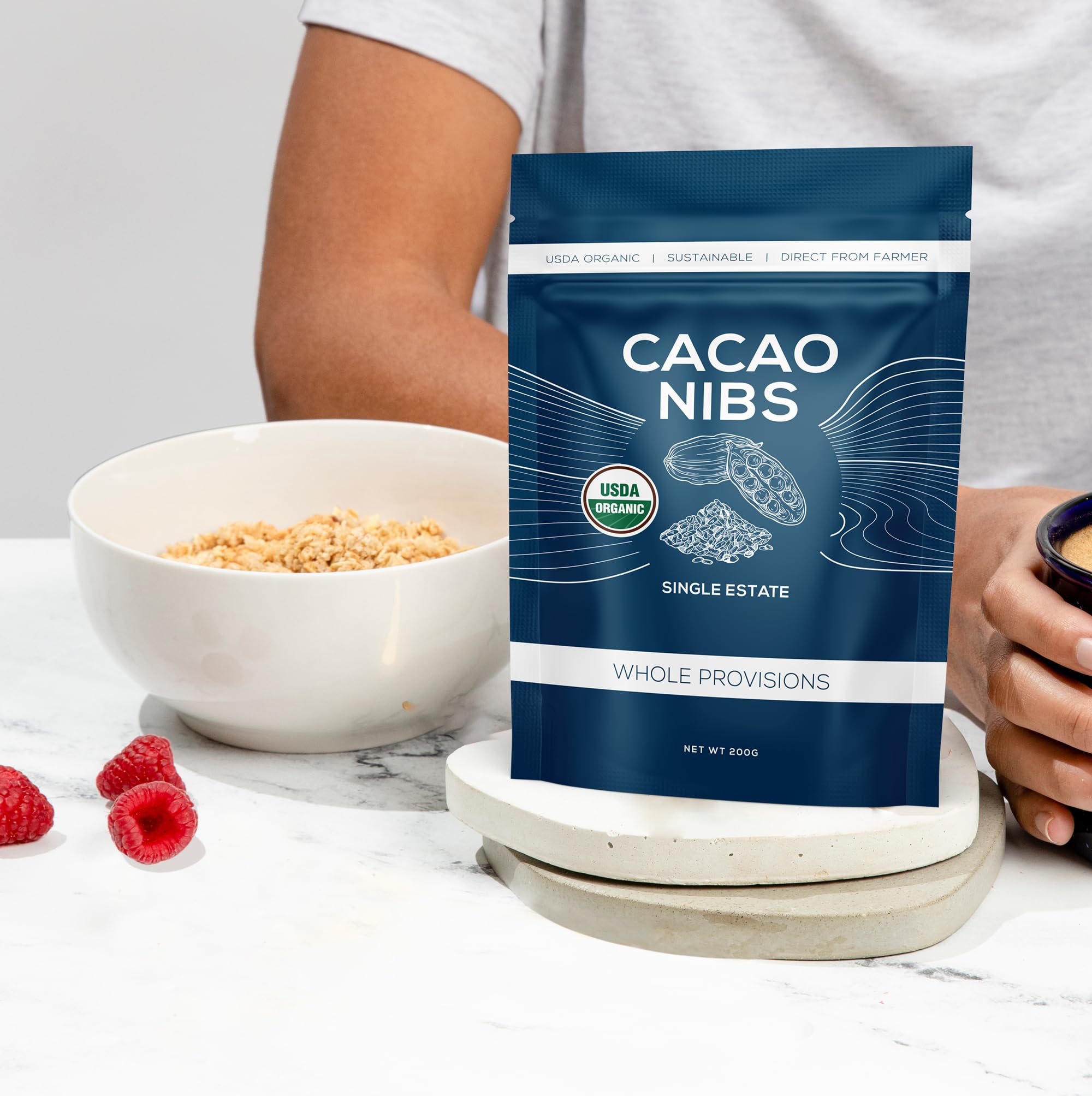 Raw appearance of One Farm by WAAYB cacao nibs highlighting natural form.