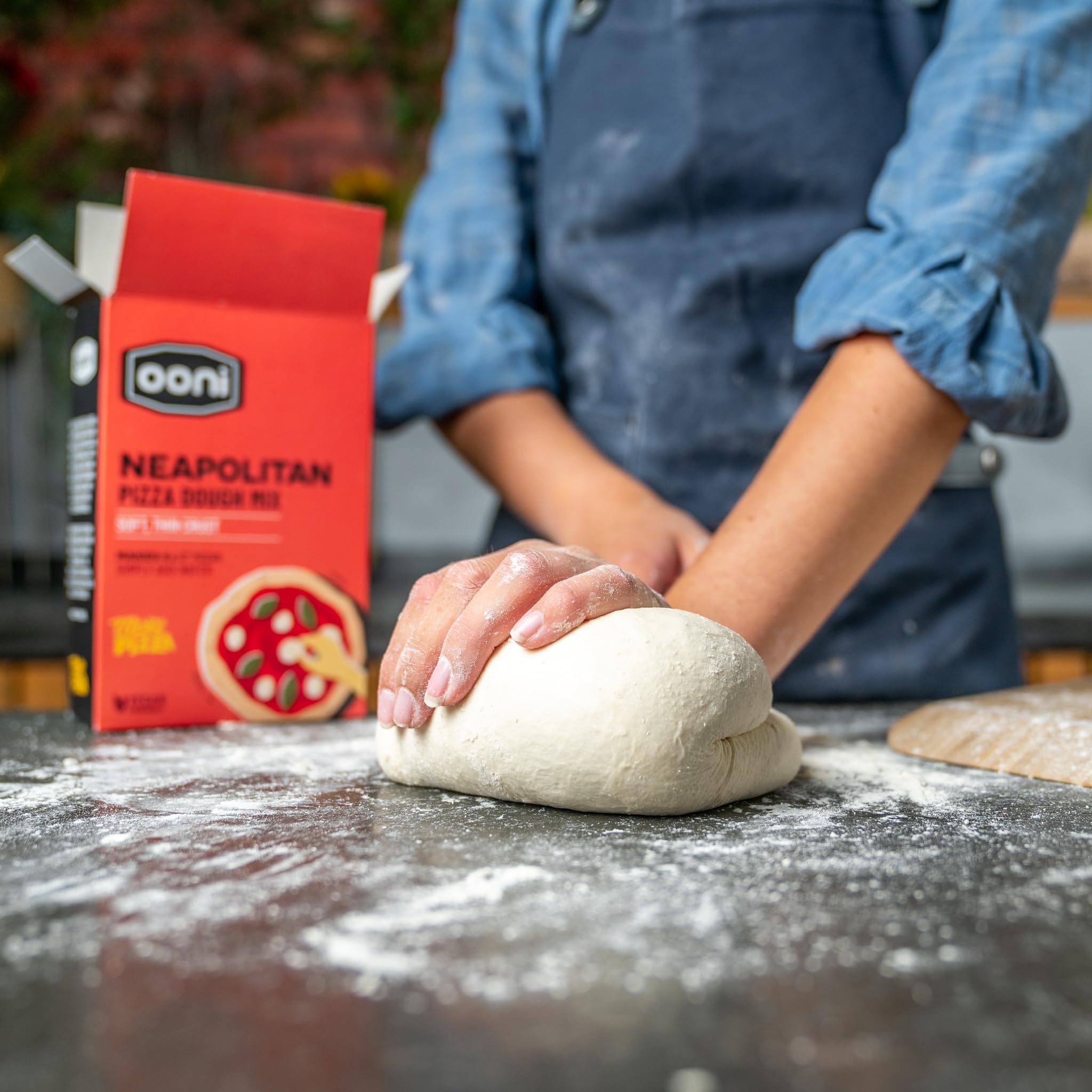 Ooni Neapolitan dough crust baking in a home oven.