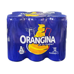 Orangina Pulpe served in a glass, highlighting fruity aroma.